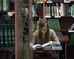 Ar guļammaisu uz bibliotēku