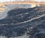 Papildināts – Ļaunprātīgi dedzina kūlu pie Dienvidu fortiem