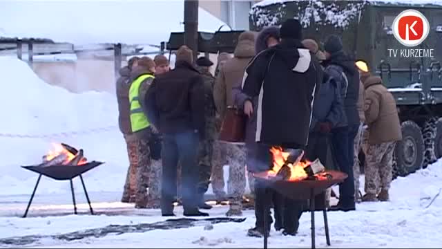 Tiekas pie atceres ugunskuriem