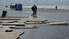 Проделки ветра на пляже: разбросанные мостки, опрокинутые контейнеры, затопленные раздевалки